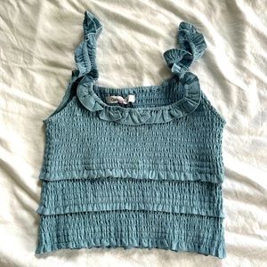 Blue smocked and ruffled crop top